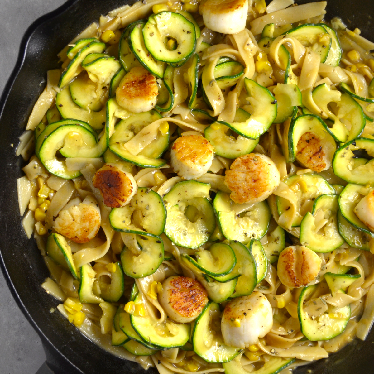 Creamy corn pasta with scallops and zucchini is an easy summer meal